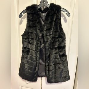 Black faux fur vest